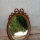Vintage Louis XVI style oval gold mirror / bow