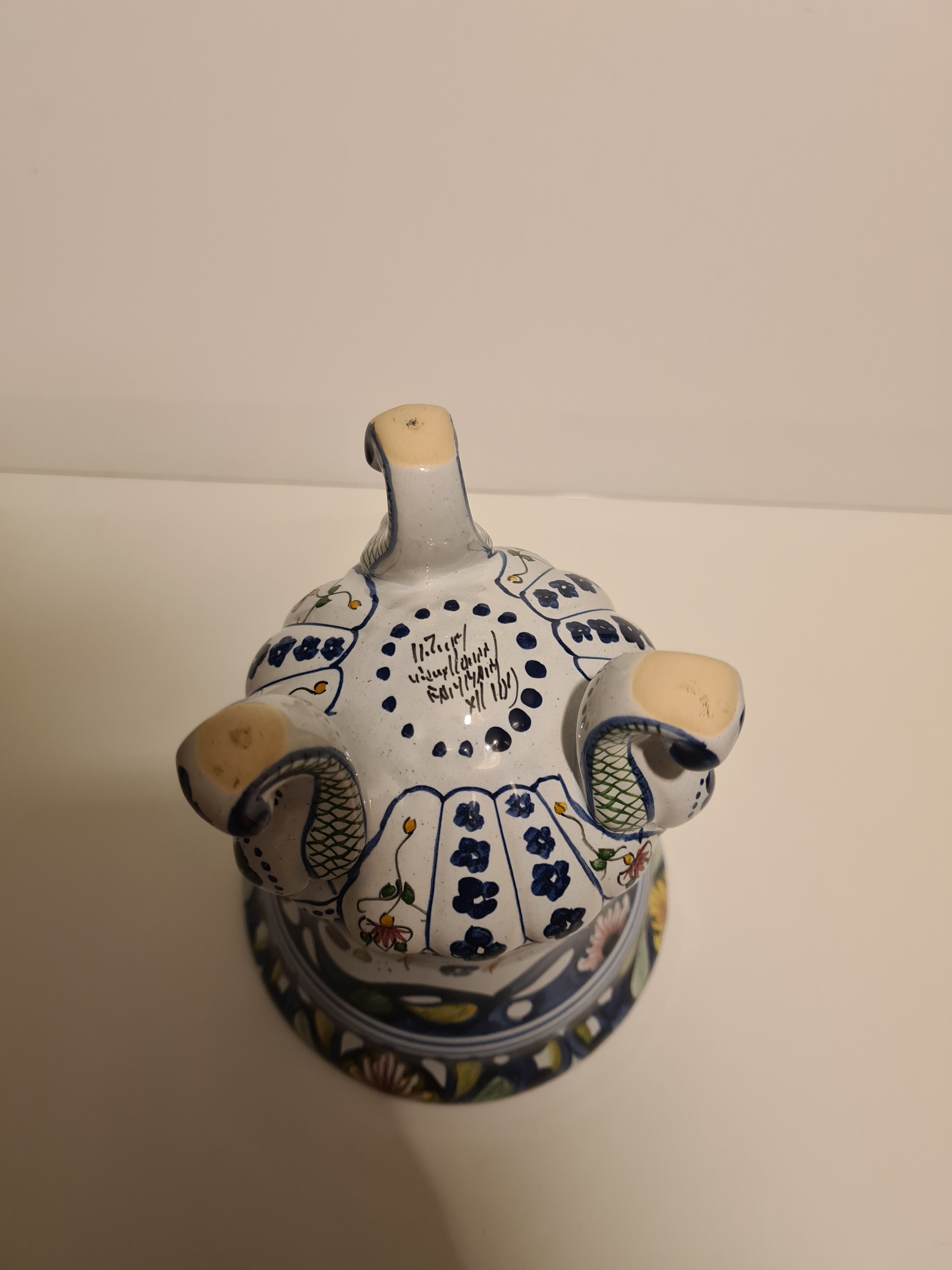 Earthenware tripod vase of Nevers floral decoration