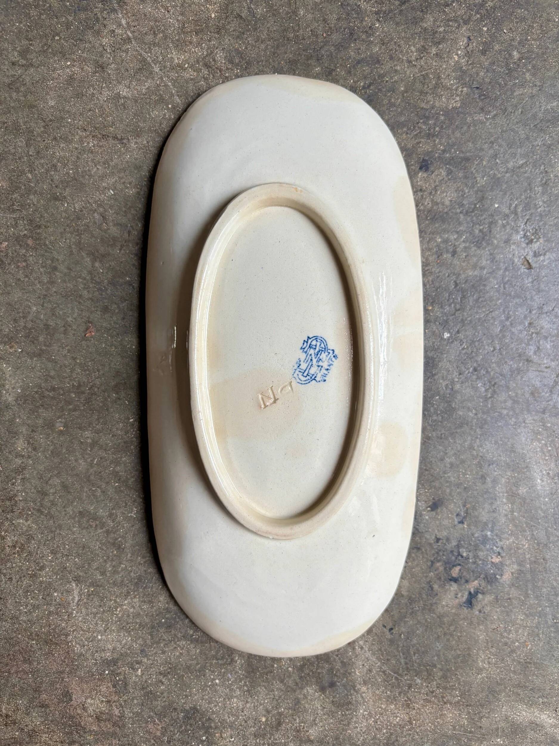 Ravier Gien in blue ironstone, "Ibis bleu" service.