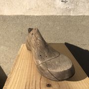 Old wooden and metal shoe tree