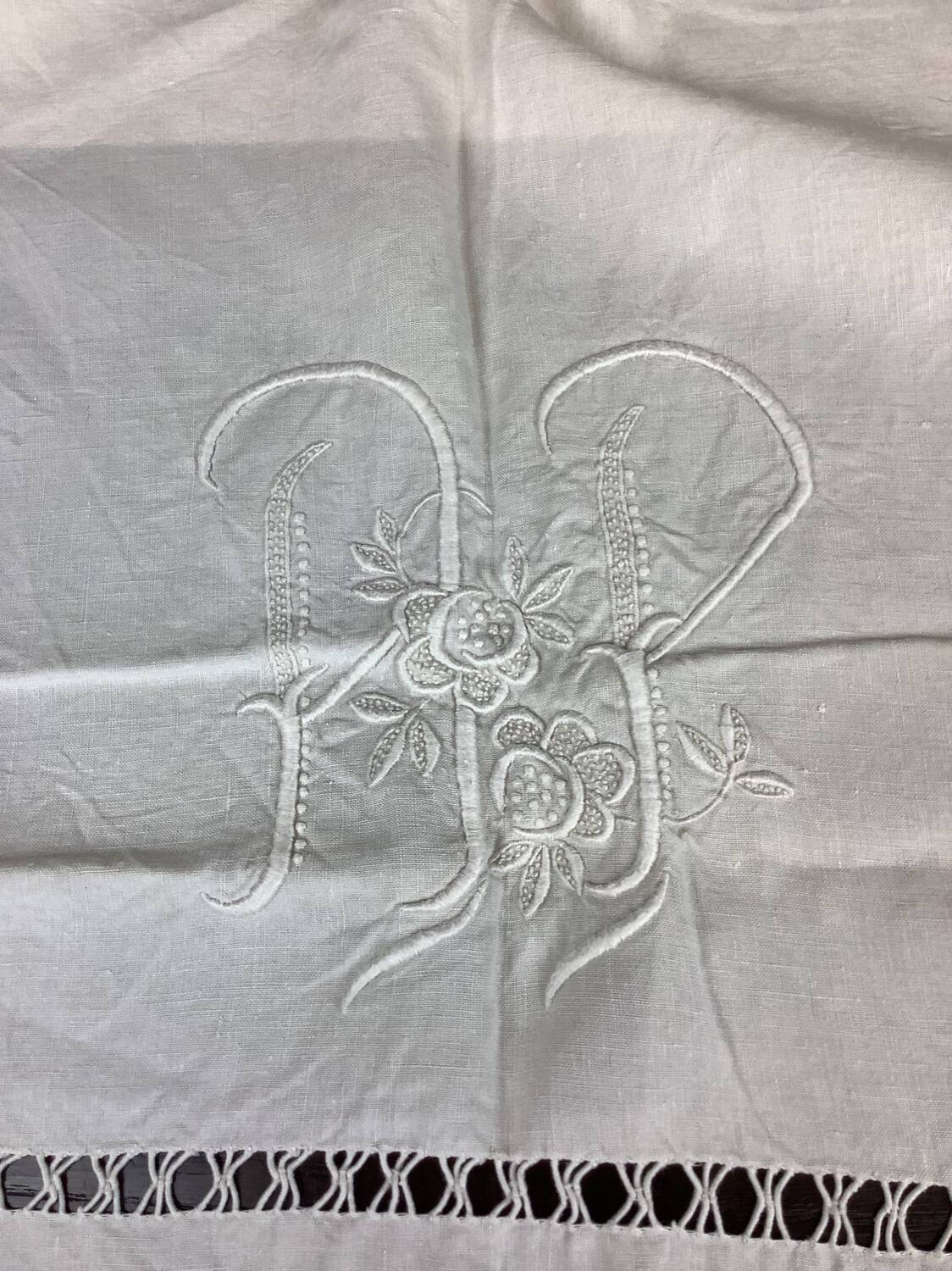 Old linen sheet with monogram embroidery
