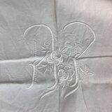 Old linen sheet with monogram embroidery