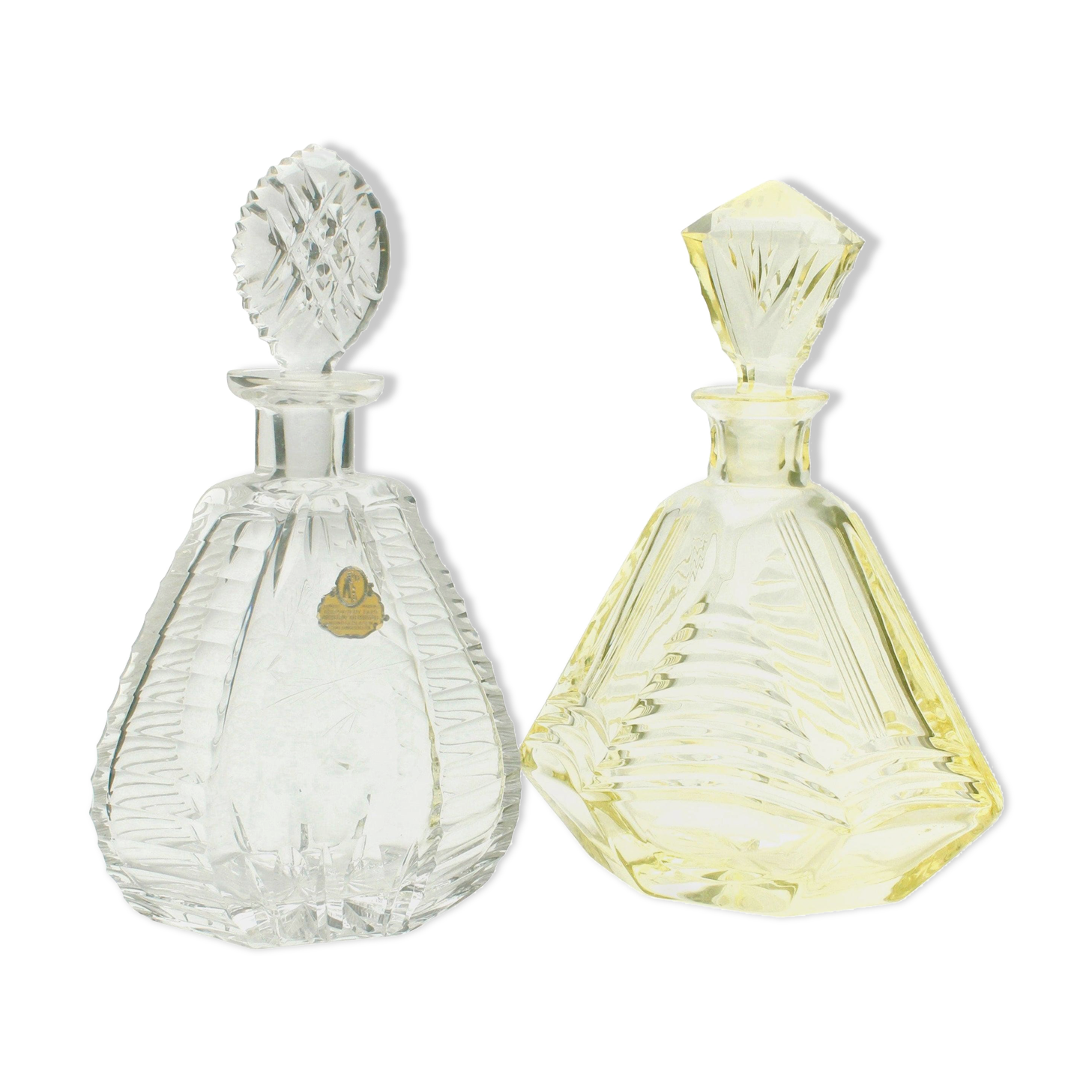 Matching pair of bohemian crystal decanters with art deco motifs