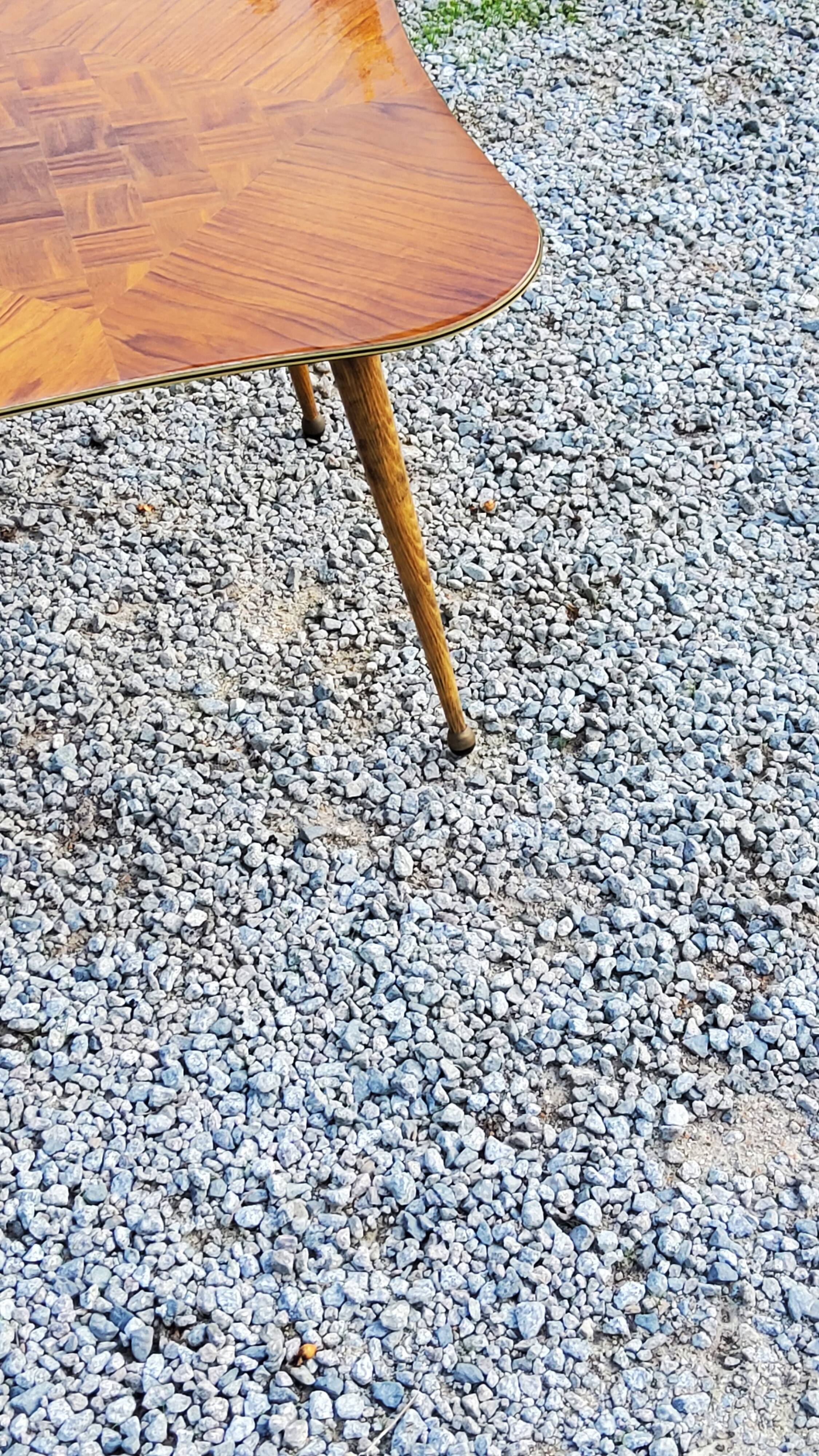 Vintage coffee table from the 50s with compass feet
