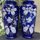 Pair of numbered white enamelled cobalt blue blown glass vases