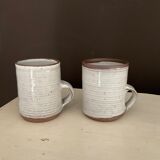 2 Mugs in Sandstone.Roger Jacques St Amand .vintage