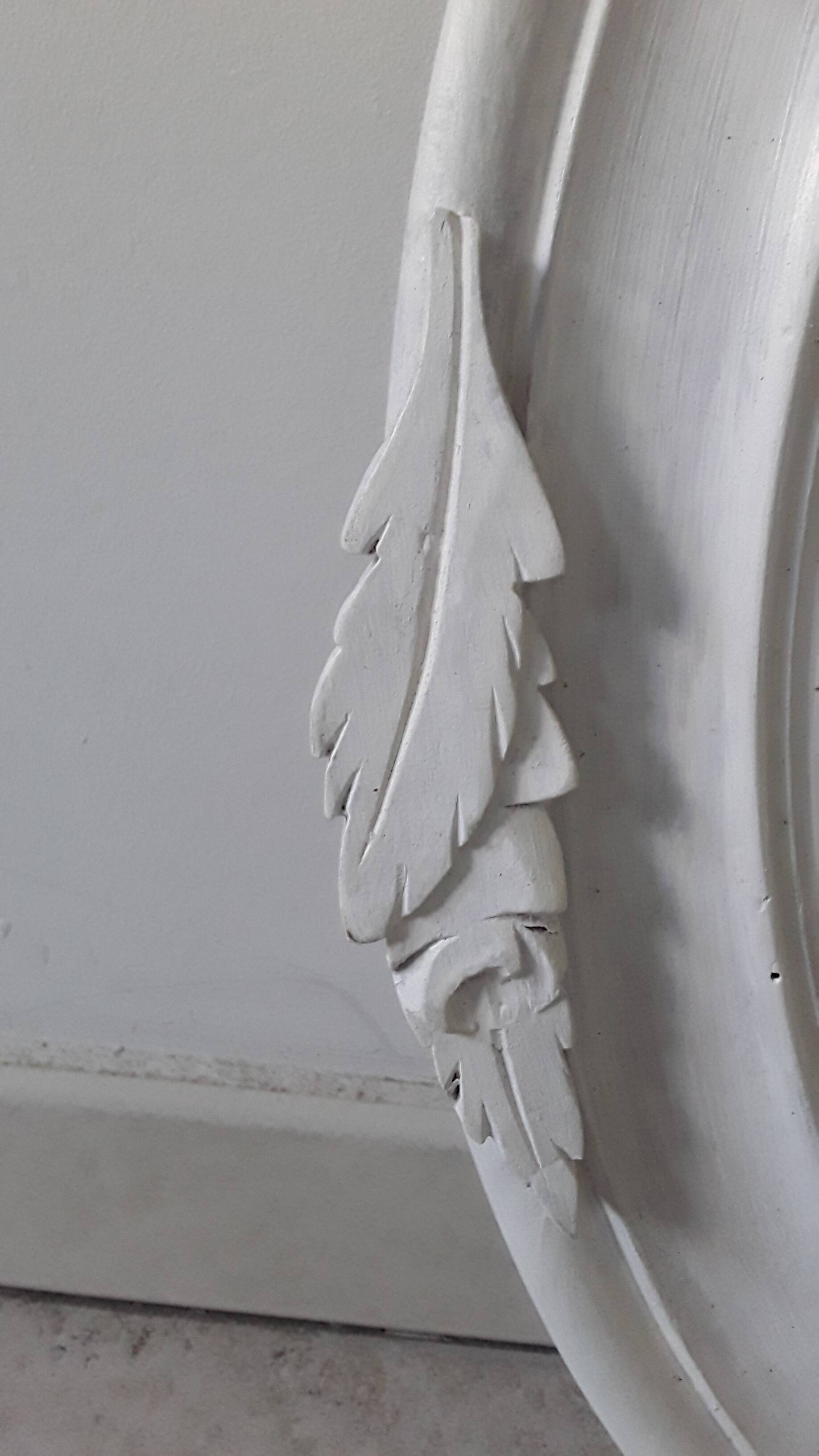 Antique oval mirror in painted wood