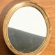 Miroir doré ovale 32x25cm