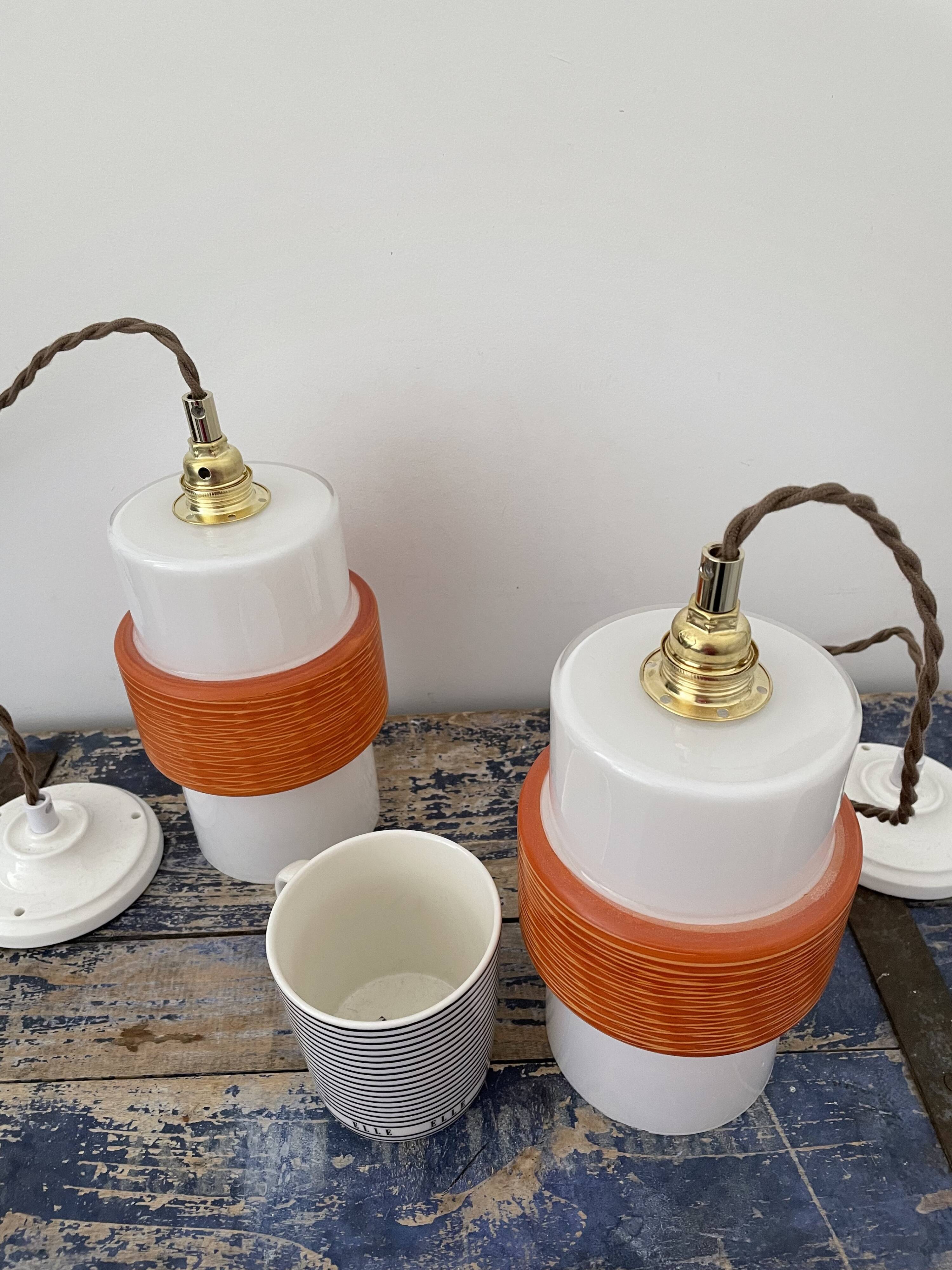 Pair of vintage suspensions electrified to nine