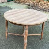 19th-century round extendable dining table with crossed legs, 115cm.