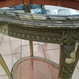 Old oval table with marble top, Louis XVI style