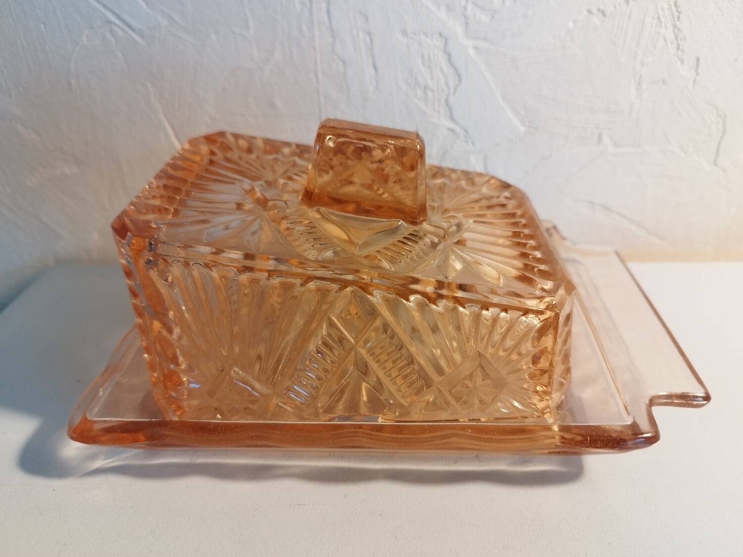 Pink glass butter dish