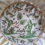 Old woven and openwork earthenware basket, with painted decoration in the center, probably 18th century