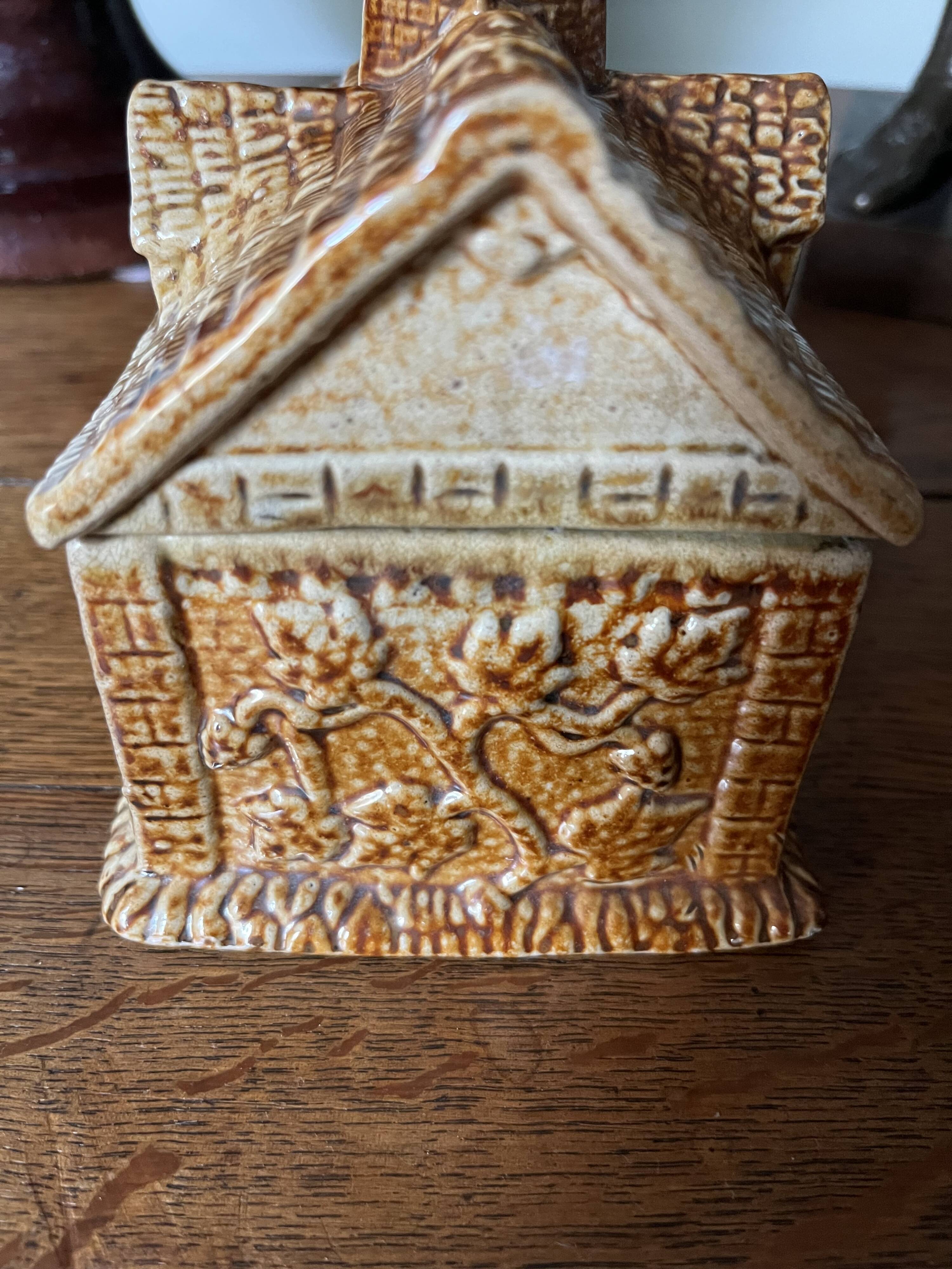 Brown salt-glazed stoneware tobacco pot with candle holder, 1840/1880
