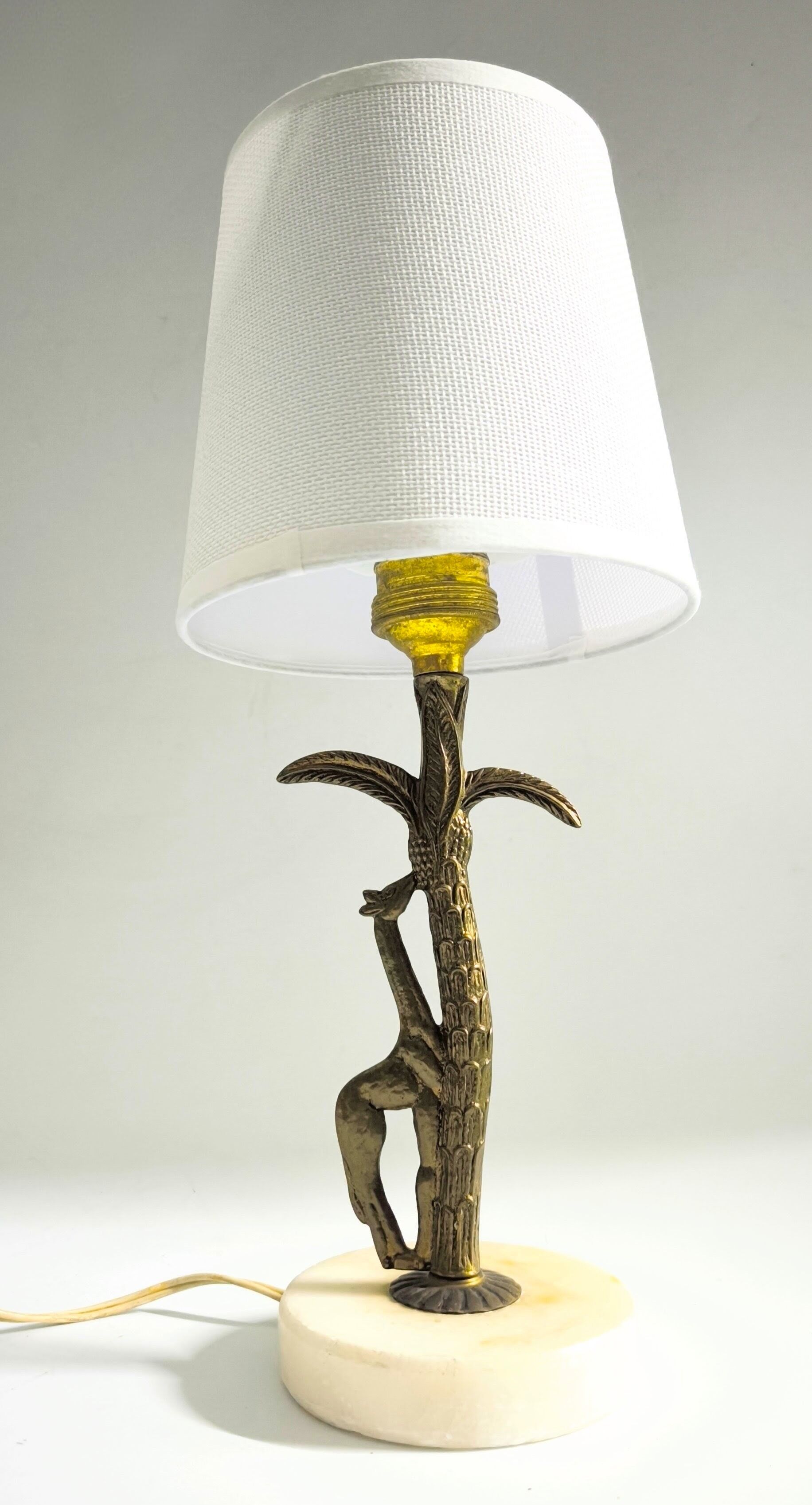 Bronze and marble lamp in Hollywood Regency style.