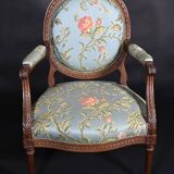 Pair of medallion back armchairs in Louis XVI style