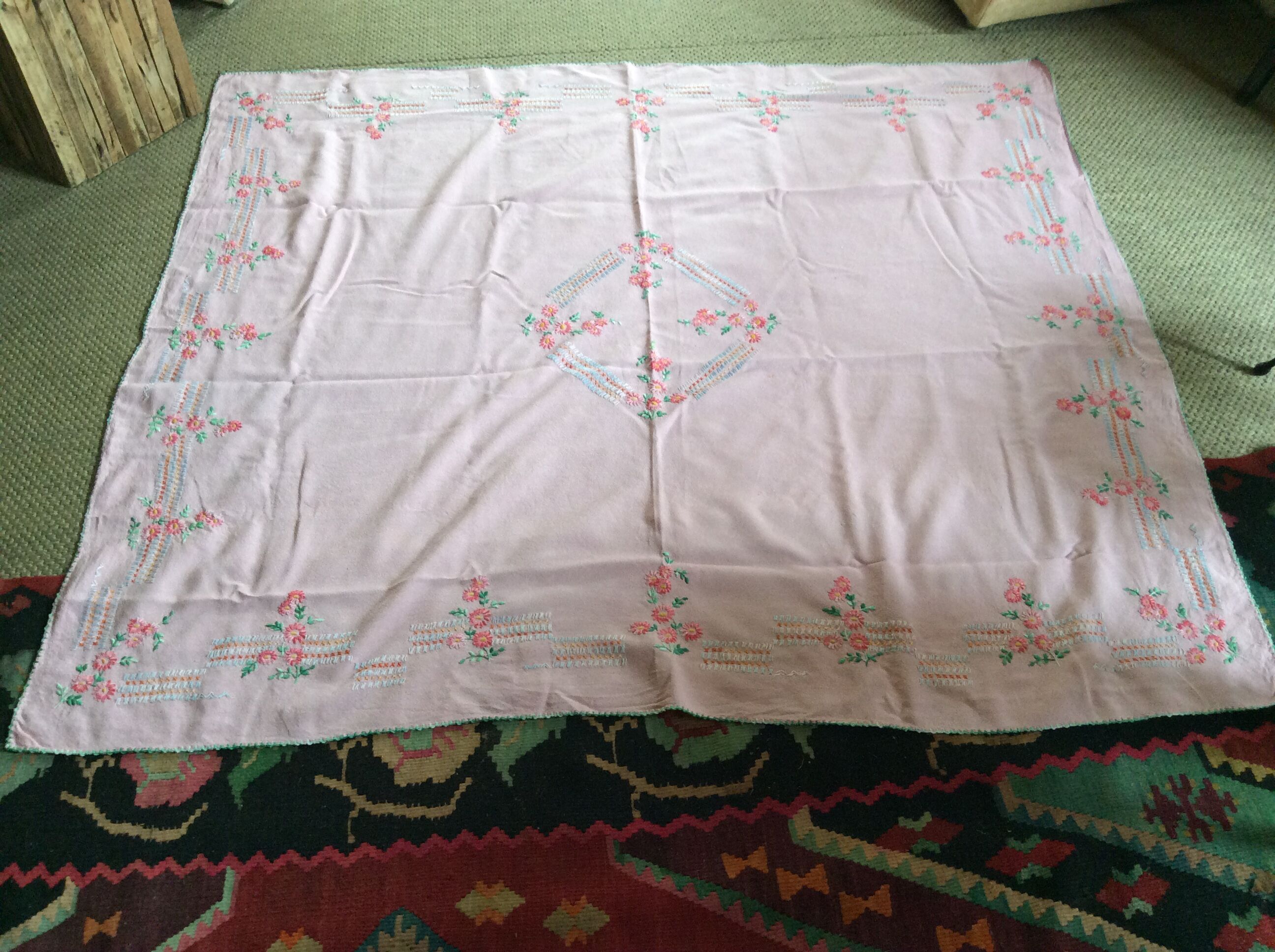 Embroidered tablecloth and 3 towels