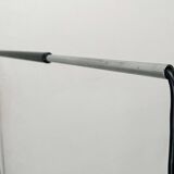 Mid-century modern Danish extendable cantilever wall lamp with a rattan shade, 1960s.