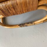 Pair of leather and bamboo armchairs