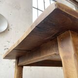 Oak farmhouse table and its two benches