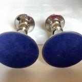 Pair of silver metal candlesticks