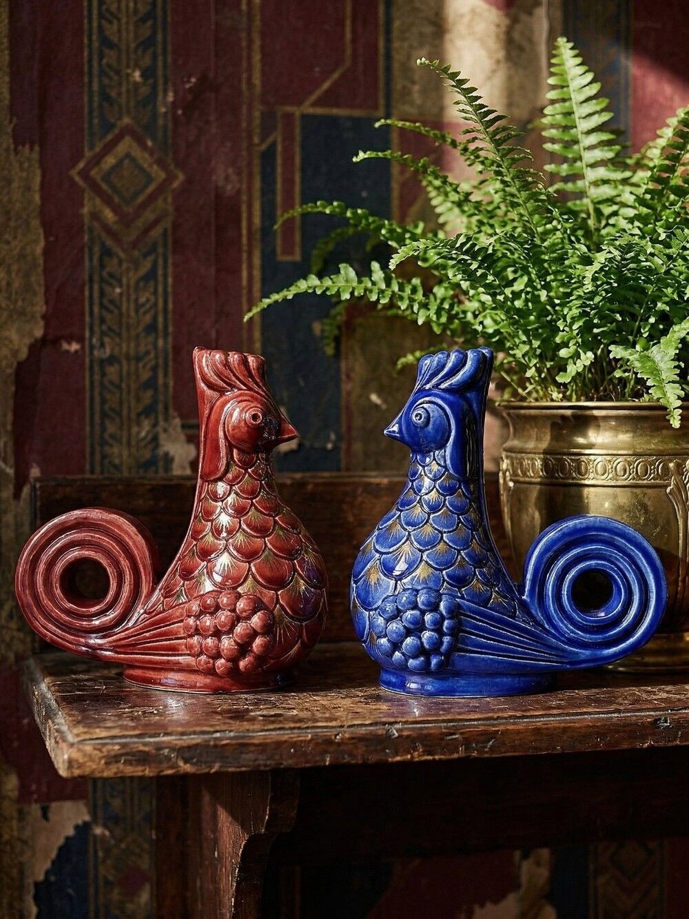 Pair of ceramic glazed candlesticks in the shape of roosters, signed A.G Roger, year 1948.