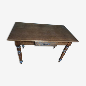 Old dining table with central drawer oak structure