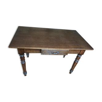 Old dining table with central drawer oak structure