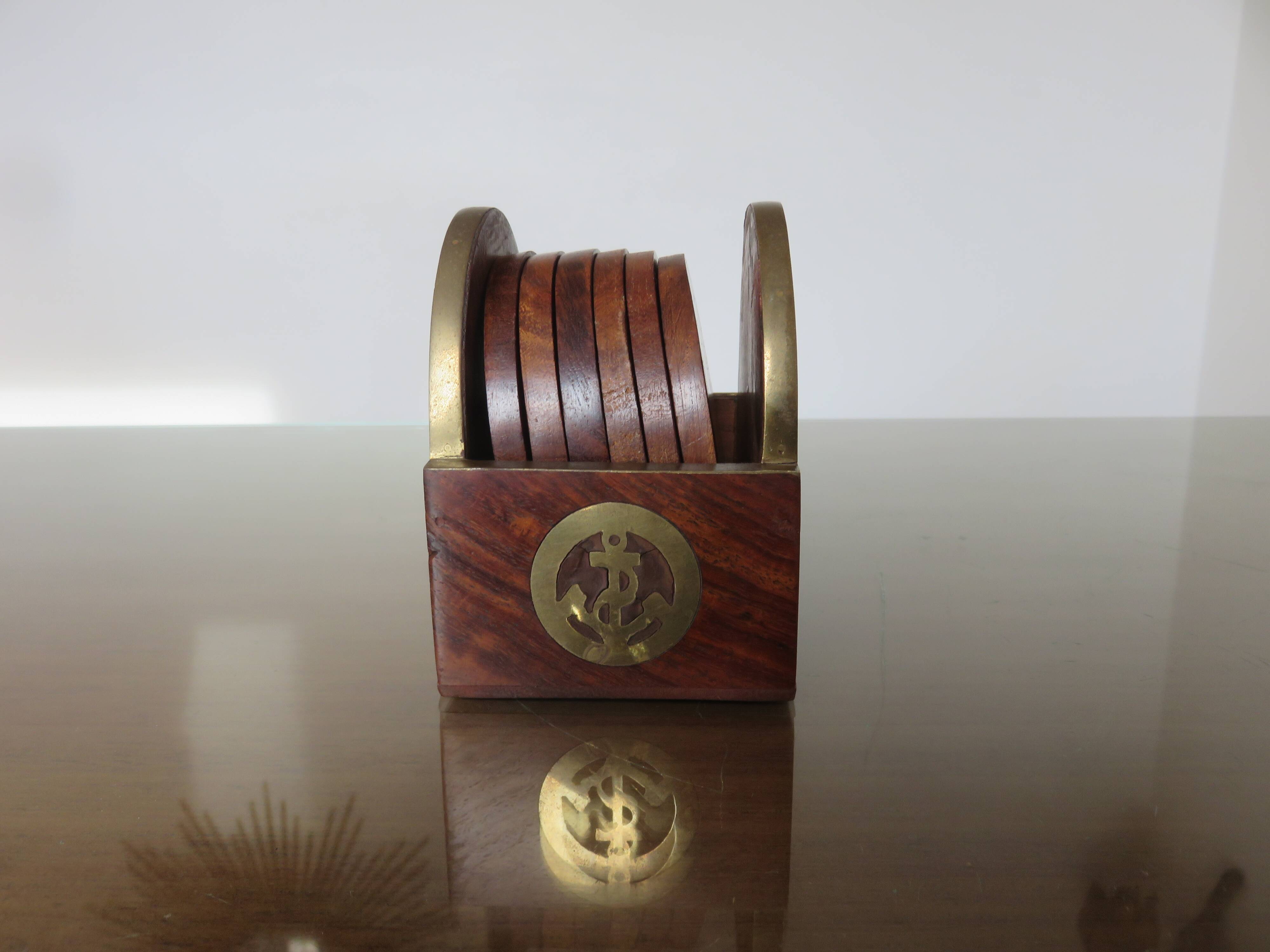 6 coasters in rosewood and brass 1970