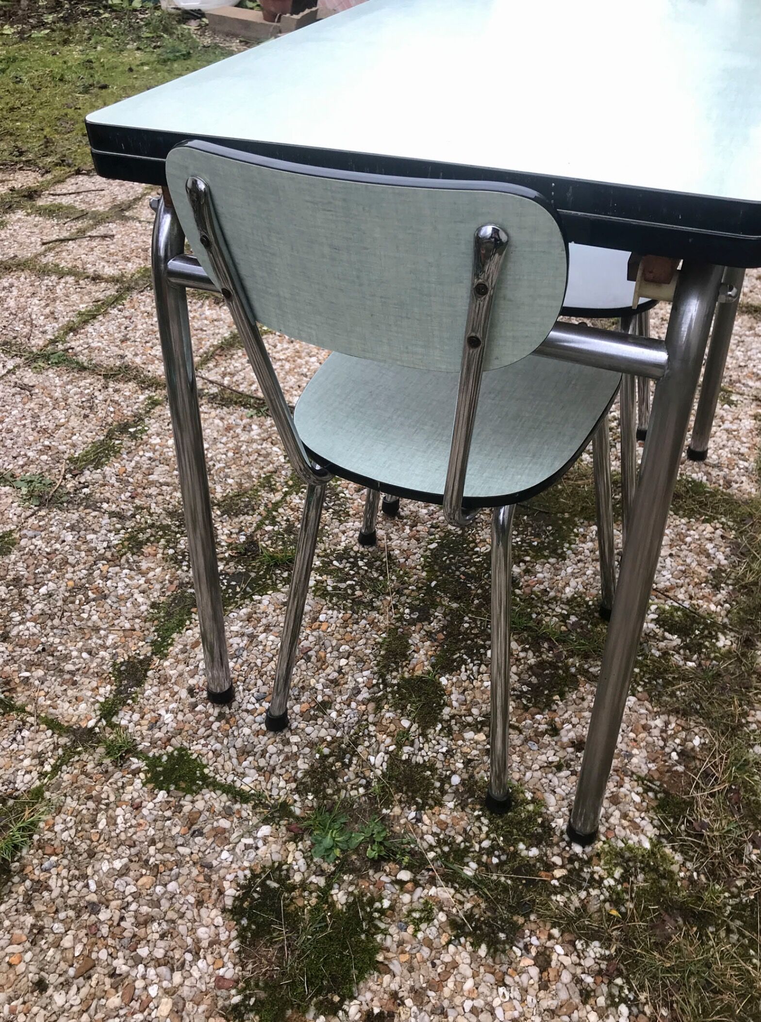 Table and chairs in water green formica