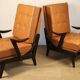 Paire de fauteuils vintage années 50 en bois noir et cuir caramel