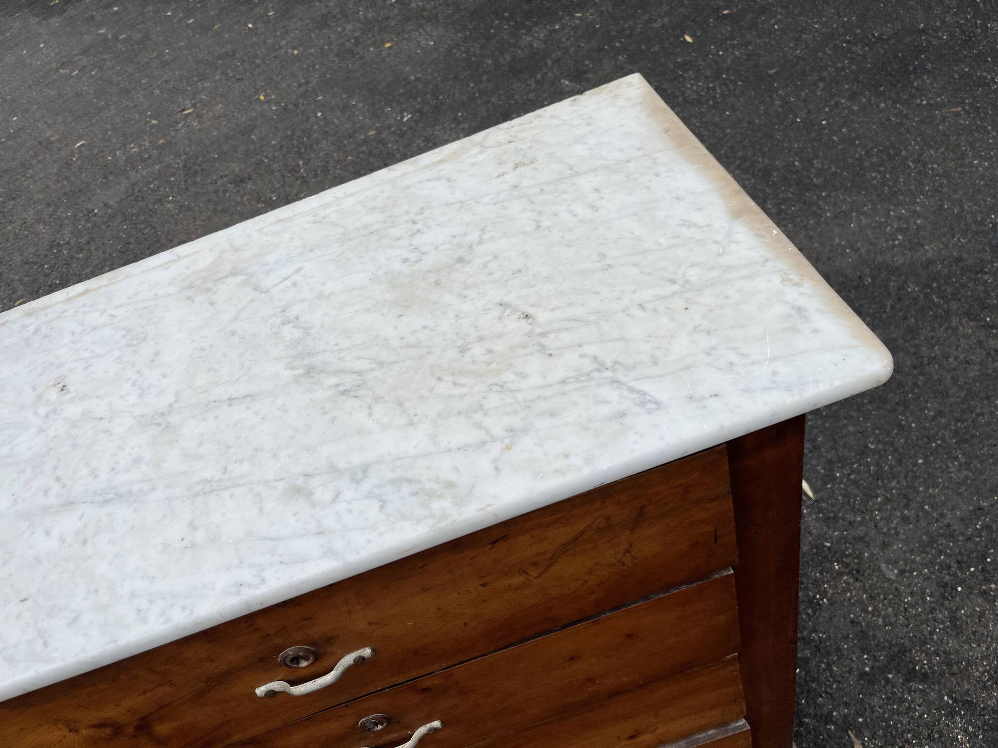 Antique 19th-century wooden chest of drawers with a marble top