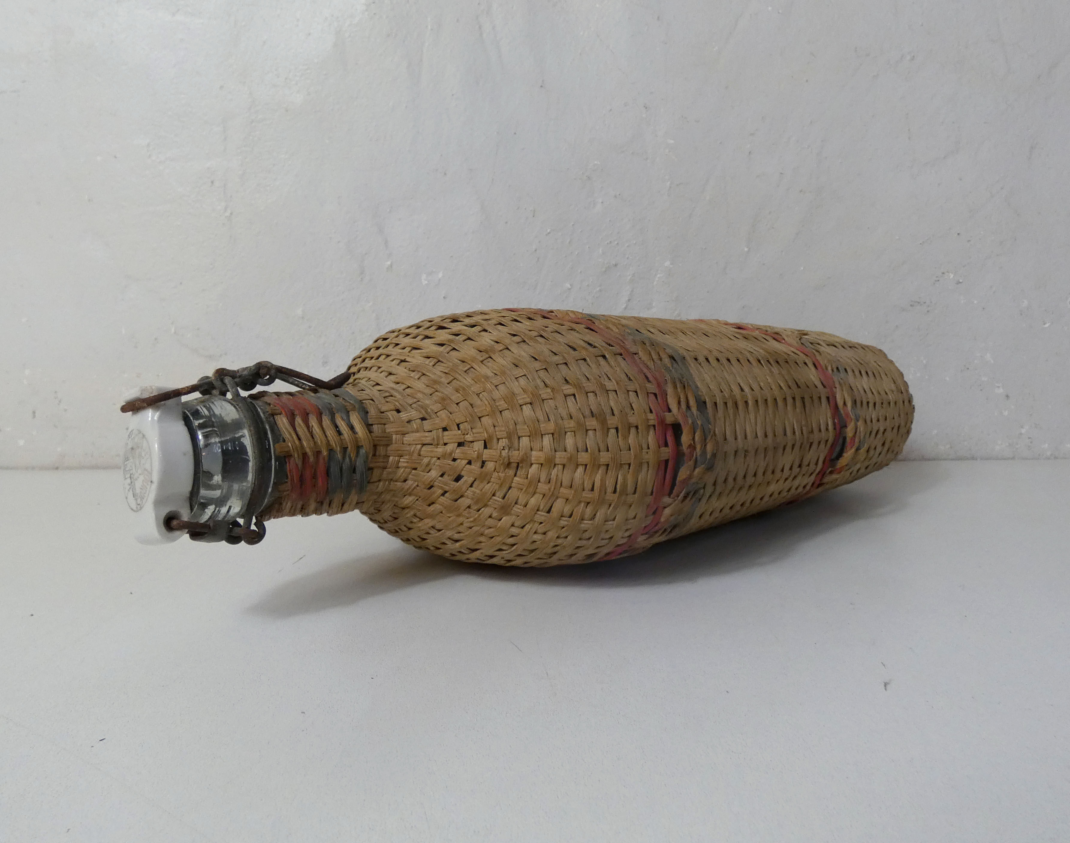 Ancient pilgrim's gourd in rattan lourdes