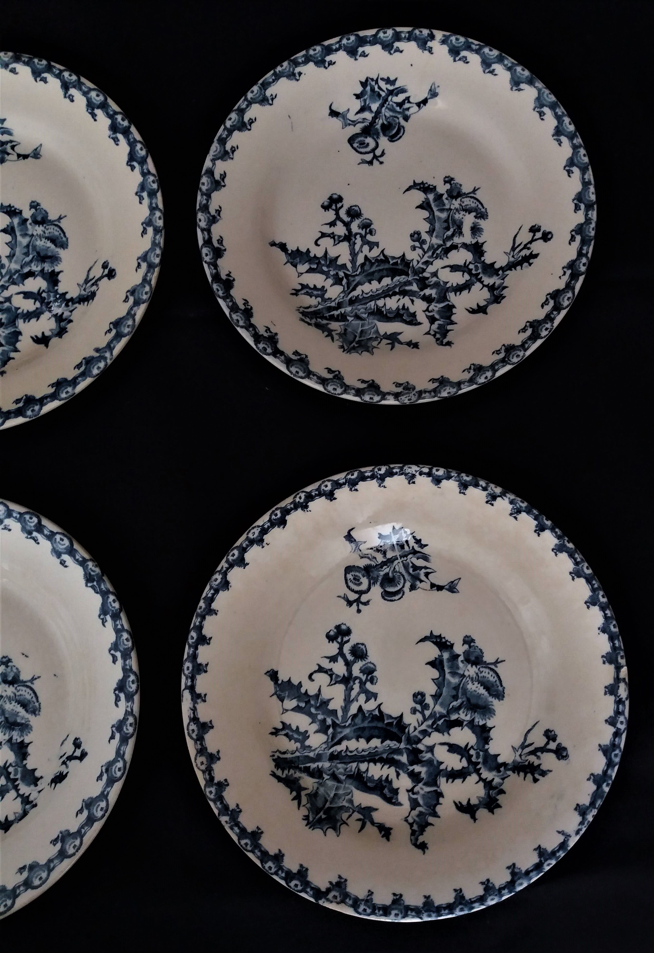 Lot of six flat plates in earthenware Gien décor blue thistles