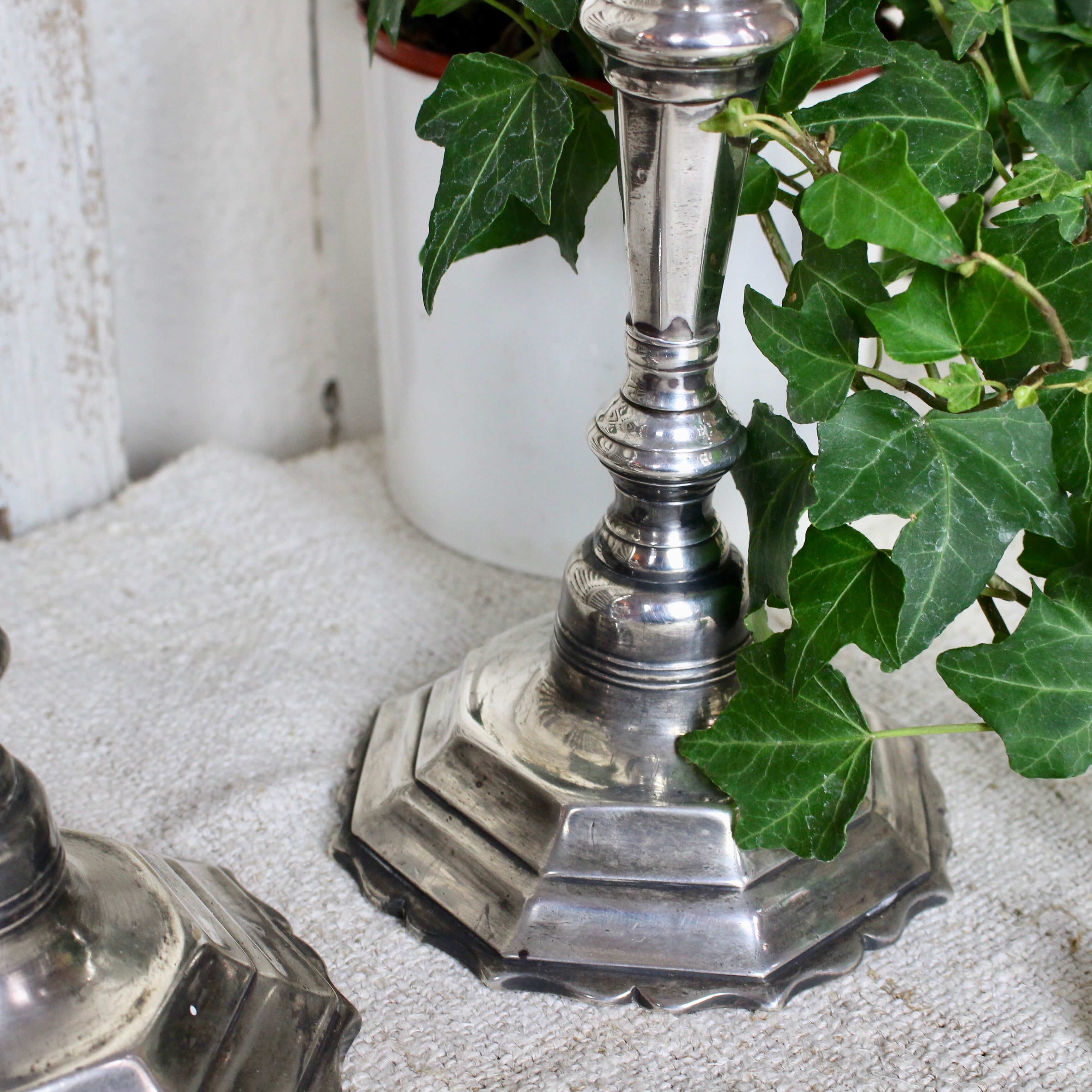 Pair of silver-plated bronze candlesticks