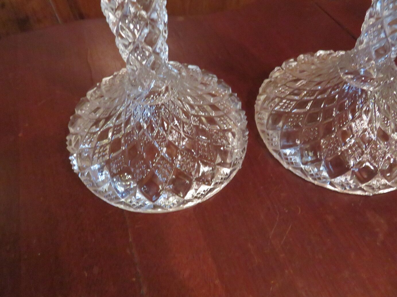 pair of molded glass candlesticks