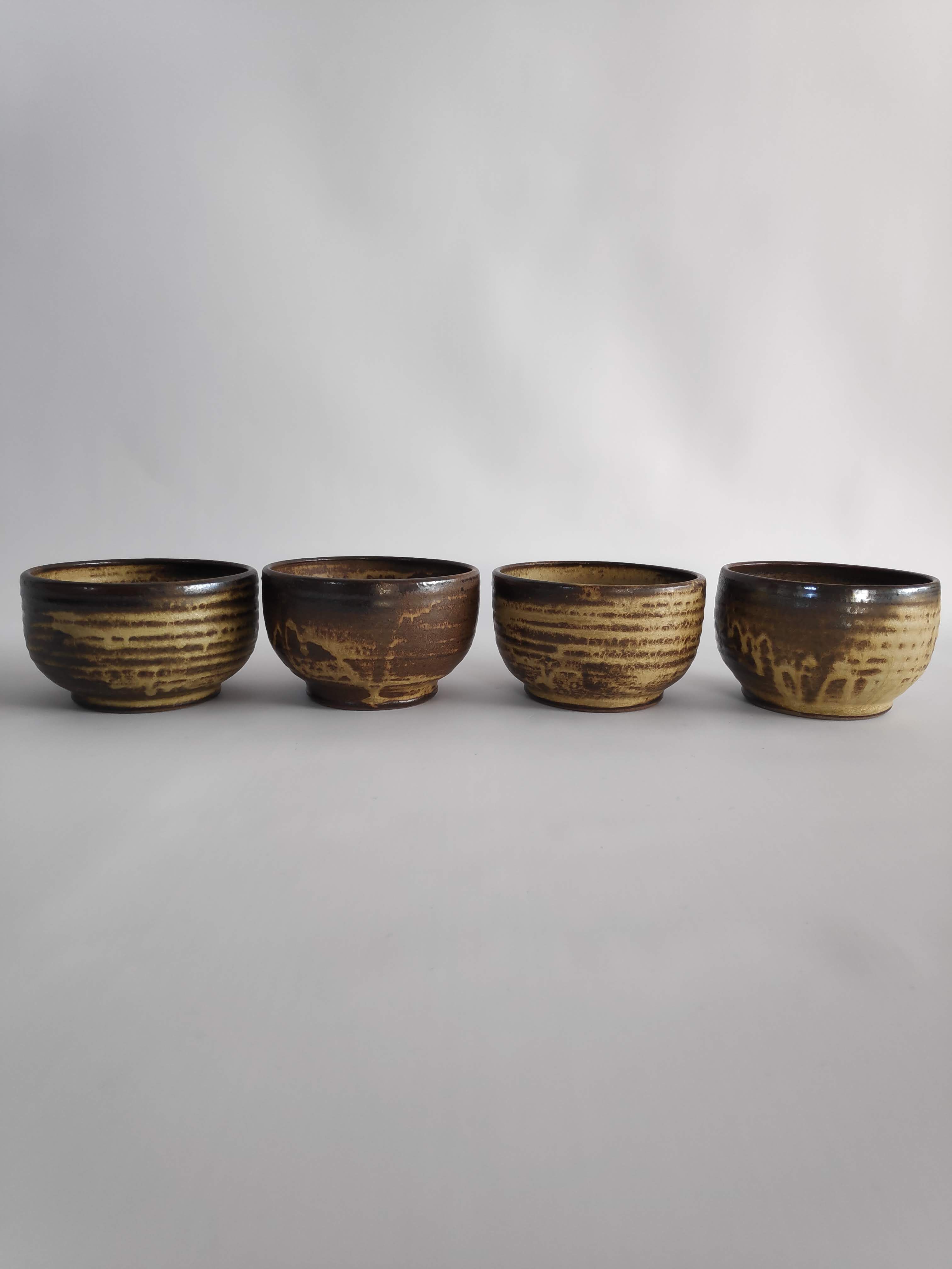 4 bowls in Brown sandstone of the years 70