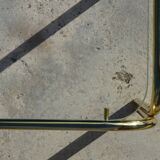 Nested tubular tables in gold metal.