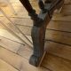 Wooden and iron bistro table