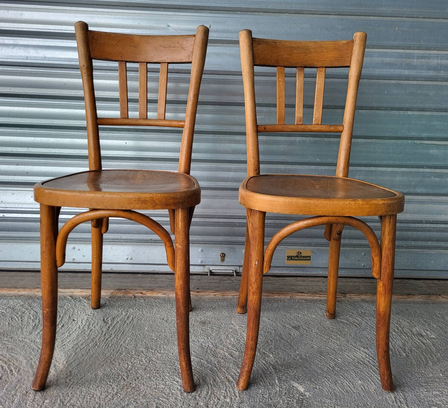 Pair of authentic antique Fischel Vintage bistro chairs