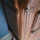 2 beds and a vintage bedside table in solid cherry wood