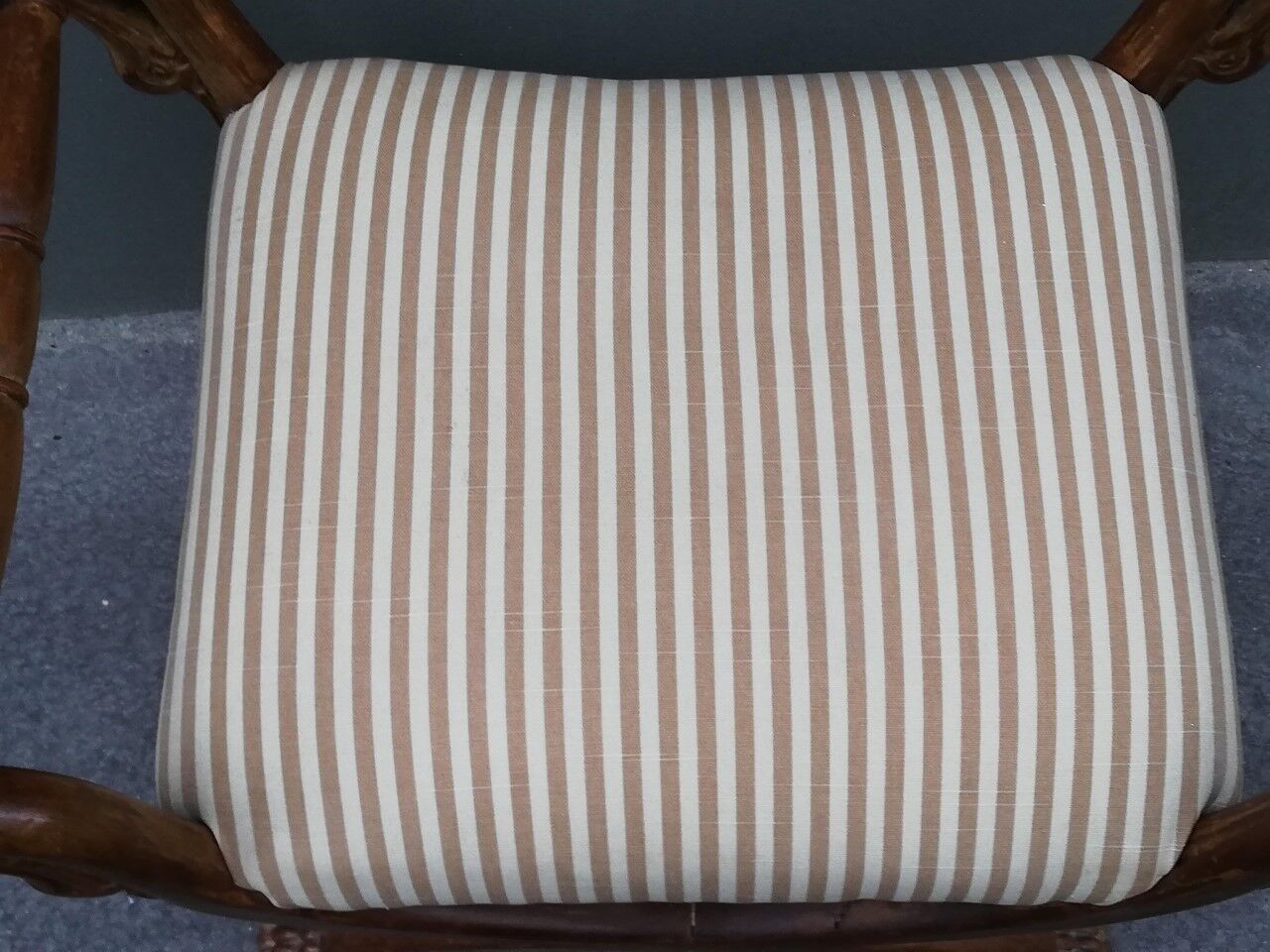 Massive walnut curule seat