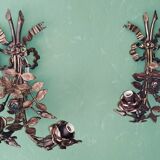 Pair of bronze and gilded metal wall sconces in the Louis XVI style.