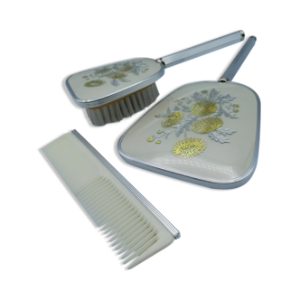Ensemble Miroir à main, peigne et brosse.