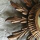 Miroir soleil en bois doré, 60