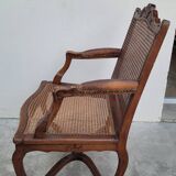 Louis XV Regency cane armchair leather armrests decorated with shell