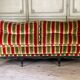 Louis XV style sofa in carved wood with a black patina