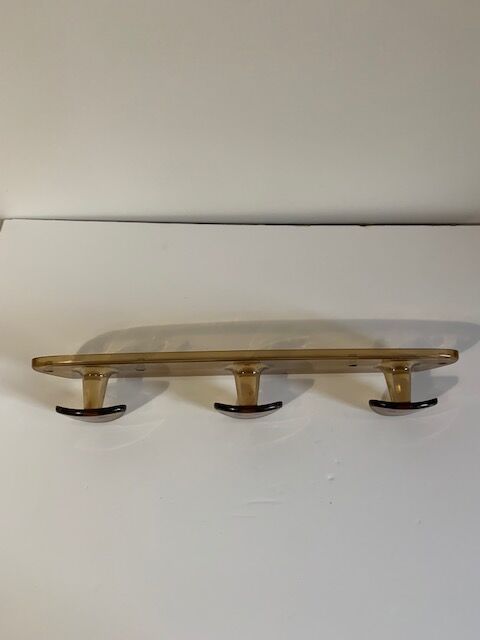 Smoked plastic coat rack