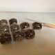 Nine knife holders made from cypraea tigris shells