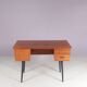 1950s small teak desk on black wooden legs Netherlands